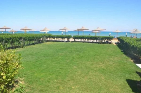 first line villa on the beach with private garden in lasrina resort